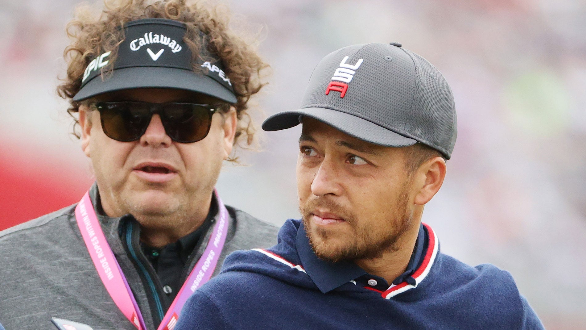 Xander Schauffele of team United States (R) and his father Stefan Schauffele look on prior to the 43rd Ryder Cup at Whistling Straits