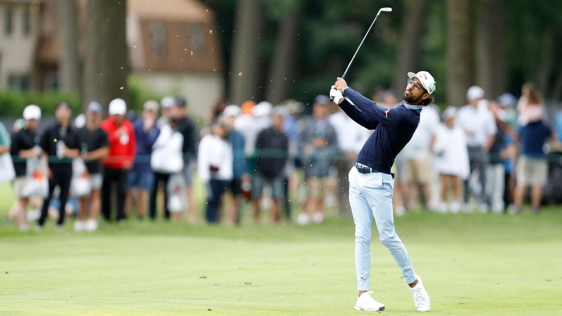 Akshay Bhatia of the United States plays an approach shot on the sixth hole during the final round of the Rocket Mortgage Classic at Detroit Golf Club on June 30, 2024 in Detroit, Michigan.
