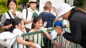 Amy Yang signed for young fans long after her round.