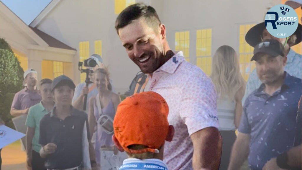 Bryson DeChambeau greets a fan at the U.S. Open.