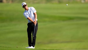 Michael Kim chips at the CJ Cup Byron Nelson.