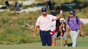 bryson dechambeau waves to the rowd during the 2024 u.s. open