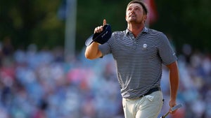 bryson dechambeau points to the sky after winning the 2024 u.s. open