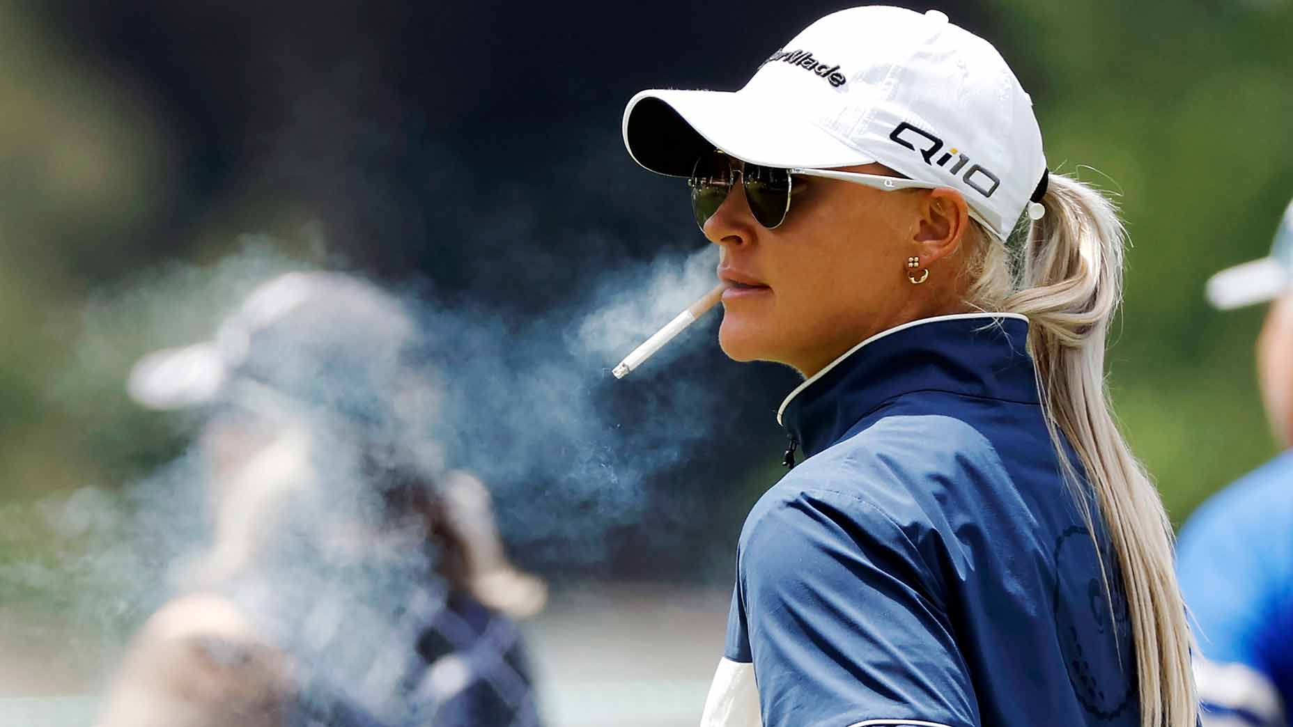 charley hull smokes a cigarette during the 2024 u.s. women's open