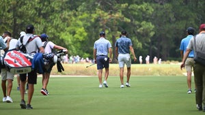 Colin Prater and Jordan Spieth walk down the fairway during a U.S. Open practice round.