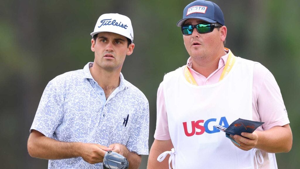 Jackson Suber and caddie Ryan Orr talk over a shot during the first round of the 2024 U.S. Open on Thursday in Pinehurst, N.C.