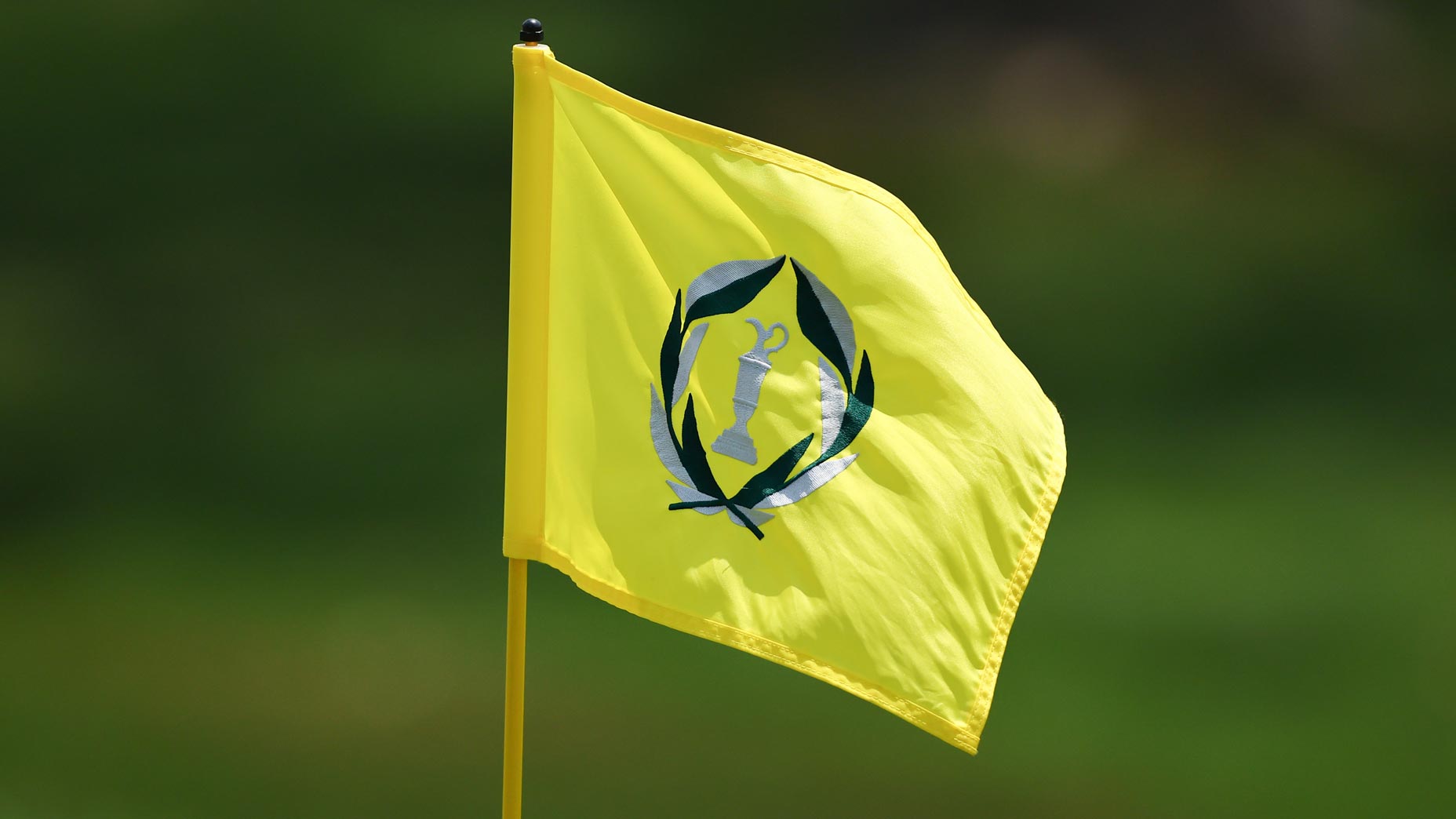 A yellow Memorial Tournament flag flies at Muirfield Village during the event