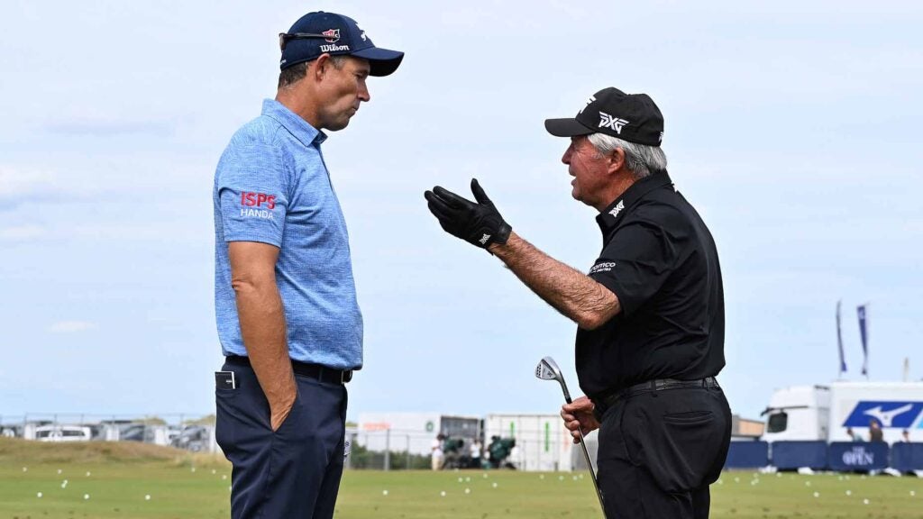 gary player talks to padraig harrinton on the range