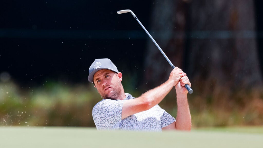 Colin Prater hits a bunker shot on the 11th hole during a practice round ahead of the 2024 U.S. Open at Pinehurst Resort & C.C.