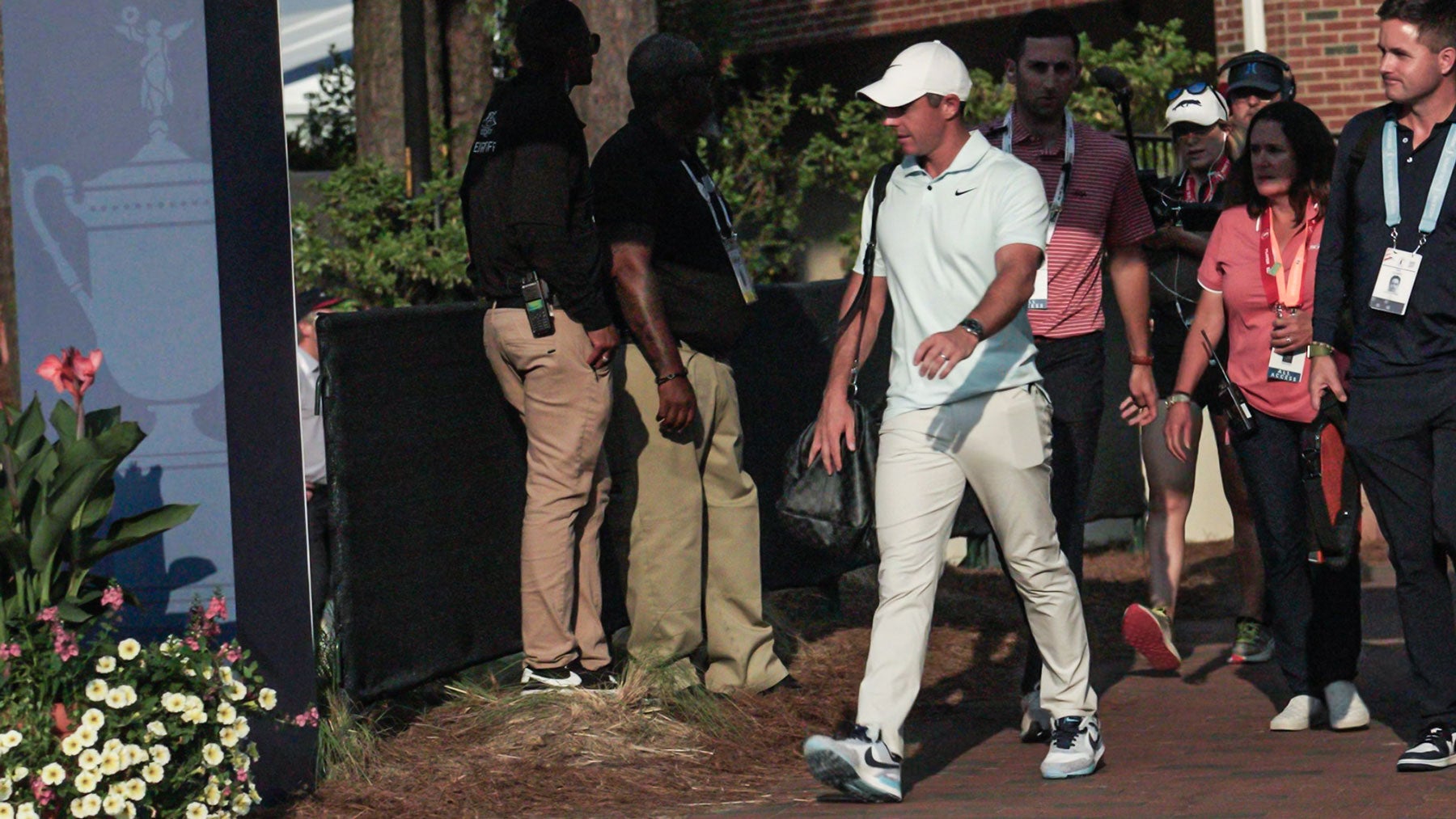 Rory mcilroy leaving the Pinehurst clubhouse after us open on sunday