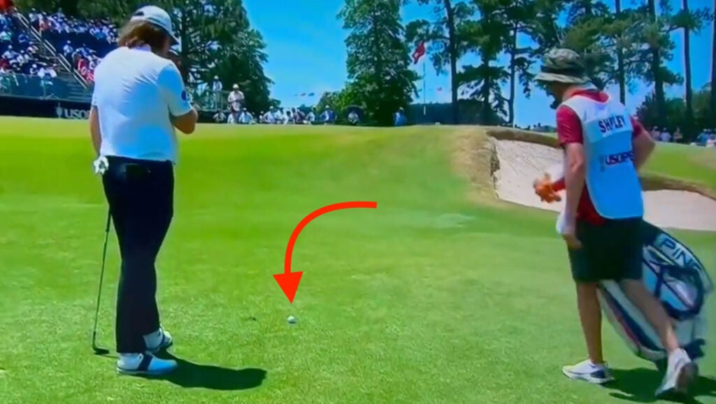 Neal Shipley examining his ball on the 13th hole in third round of u.s. open