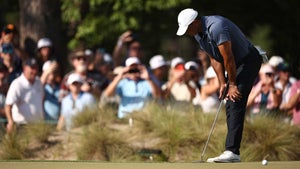 Tiger Woods reacts to a missed putt on the 15th hole at the U.S. Open on Friday.