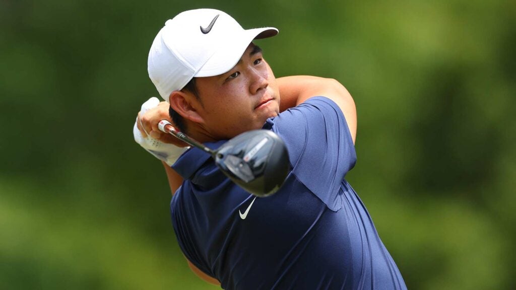 Pro golfer Tom Kim plays tee shot at 2024 U.S. Open