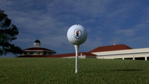 u.s. open logo ball on tee in front of pinehurst clubhouse