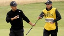 Xander Schauffele of the United States interacts with his caddie Austin Kaiser on the eighth green during day four of The 152nd Open championship at Royal Troon on July 21, 2024 in Troon, Scotland.