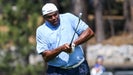 Former NBA basketball player and sports analyst Charles Barkley hits his shot on the 18th hole on day one of the 2024 American Century Championship