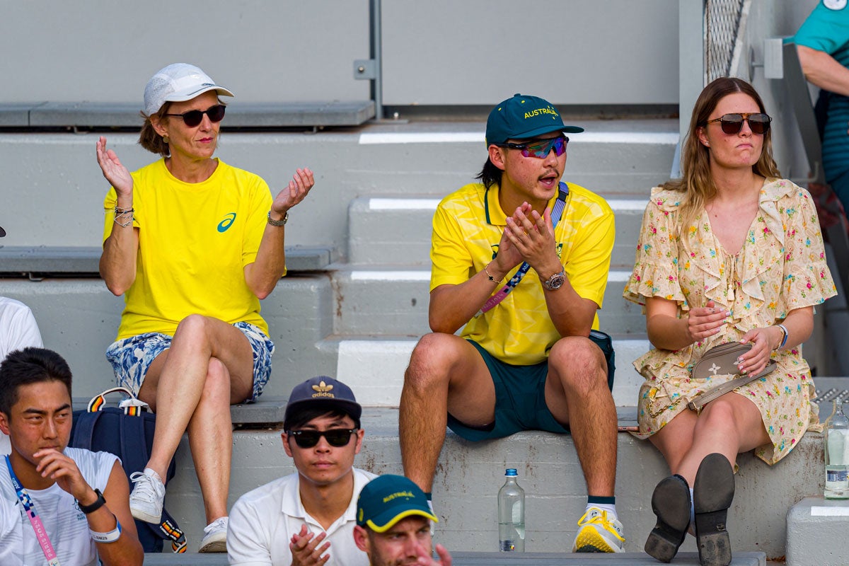 Min Woo Lee watches the Mixed Doubles first round match at the Olympics