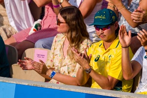 Min Woo Lee watches the Men's Doubles first round match at the Olympics