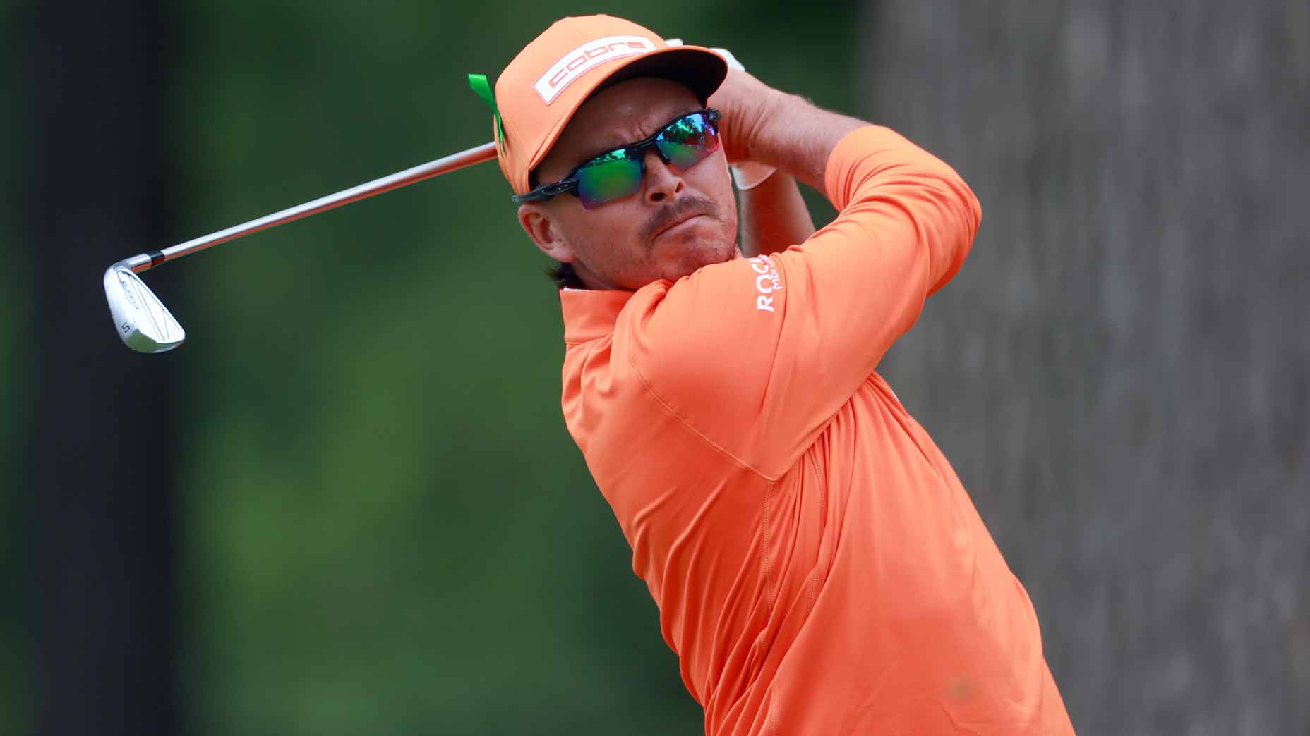 rickie fowler swings during the 2024 rocket mortgage classic