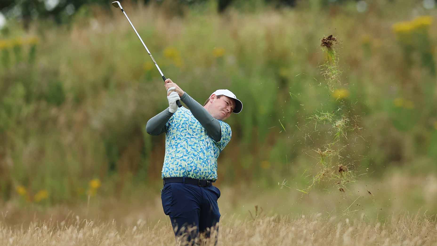 robert macintyre hits a shot from the deep fescue at the scottish open