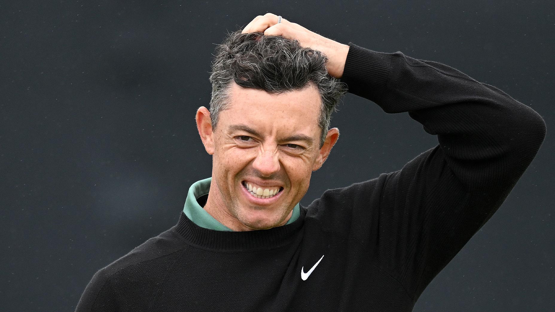 rory mcilroy scratches head at Open championship