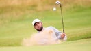 Pro golfer Scottie Scheffler hits bunker shot at 2024 Open Championship