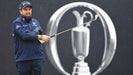 Pro golfer shane lowry hits an iron during the 2024 open championship