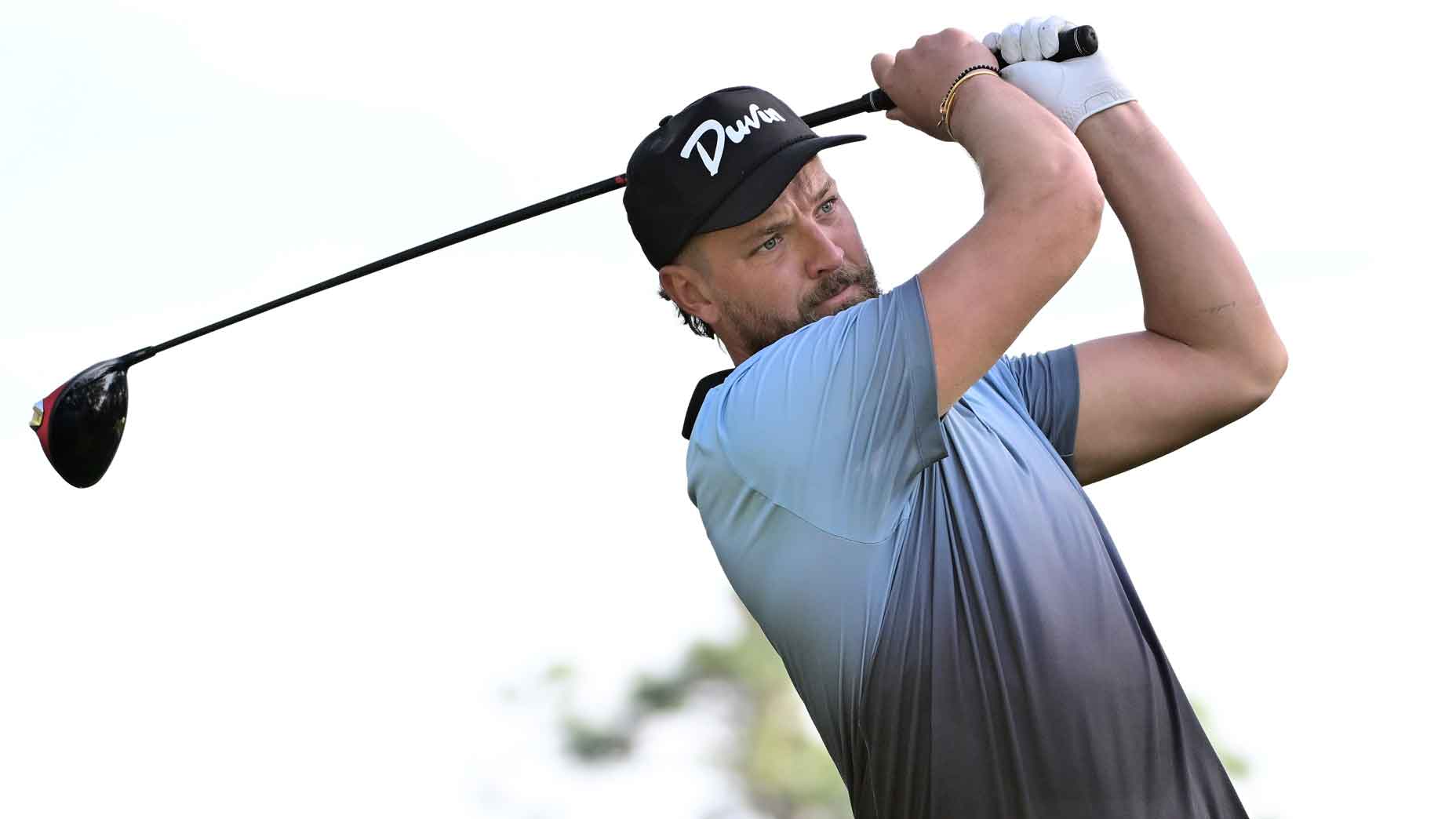 Former professional basketball player Chandler Parsons plays his shot from the eighth tee during the second round of the Hilton Grand Vacations Tournament of Champions at Lake Nona Golf & Country Club on January 19, 2024 in Orlando, Florida.