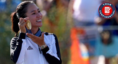 Lydia Ko poses with her medal at the Olympics.