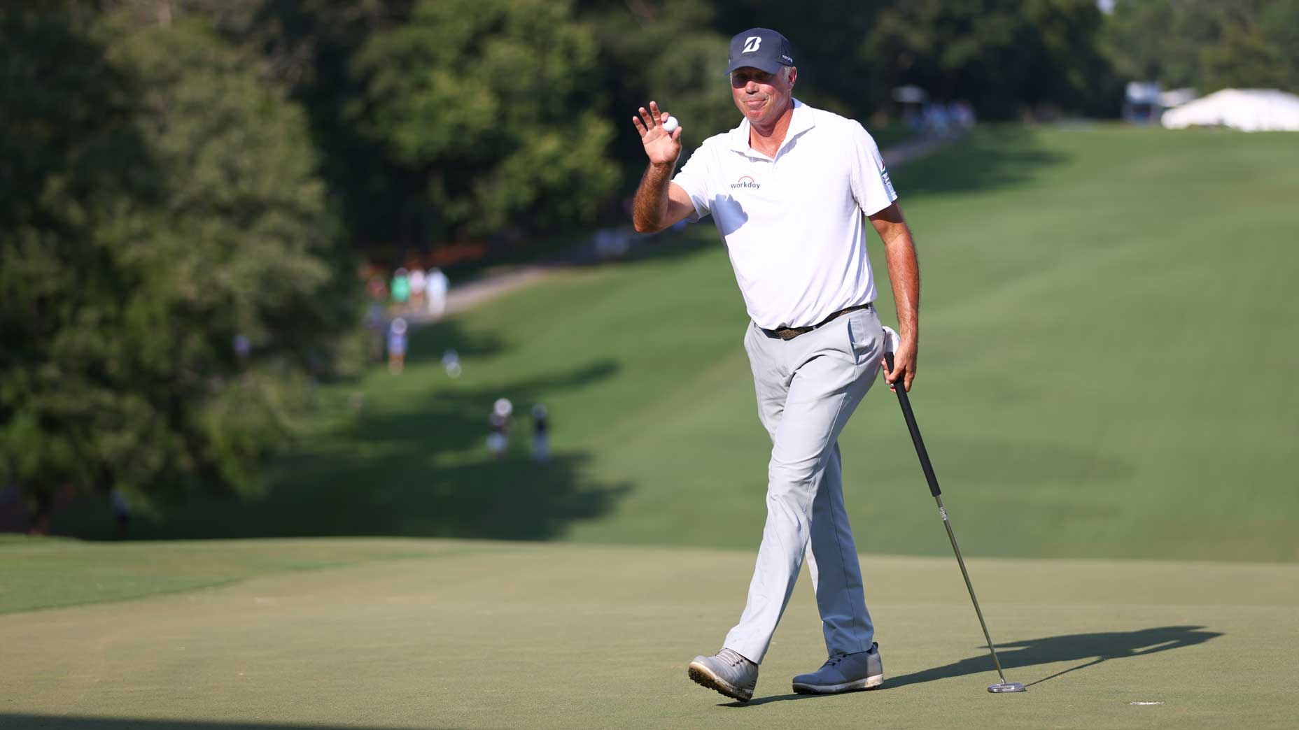 Matt Kuchar reacts to a birdie putt at Wyndham.