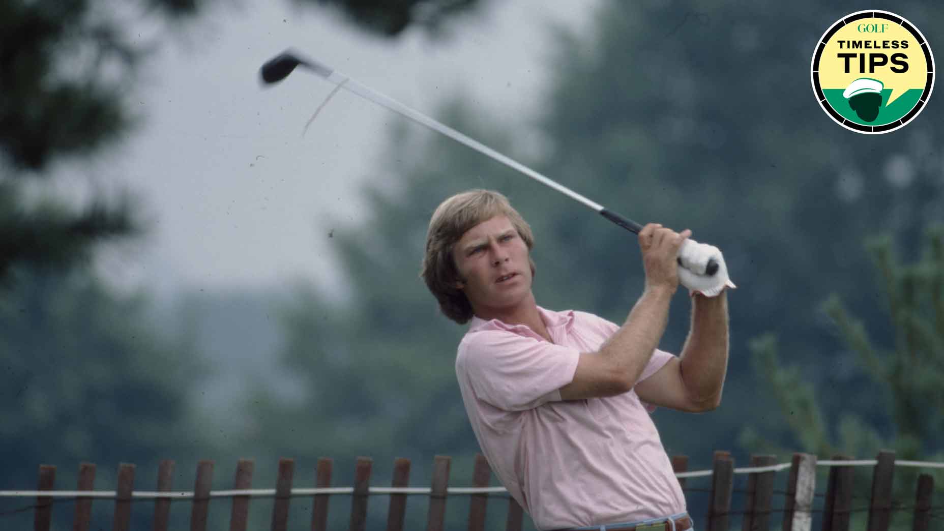 Pro golfer ben crenshaw hits a driver