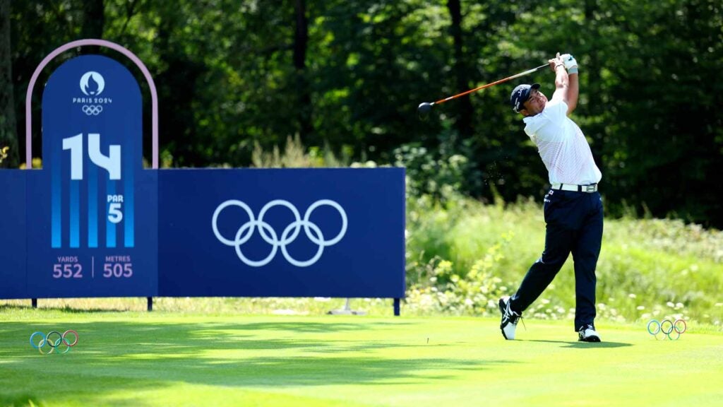 hideki matsuyama hits a tee shot during round 1 of the 2024 olympic golf competition