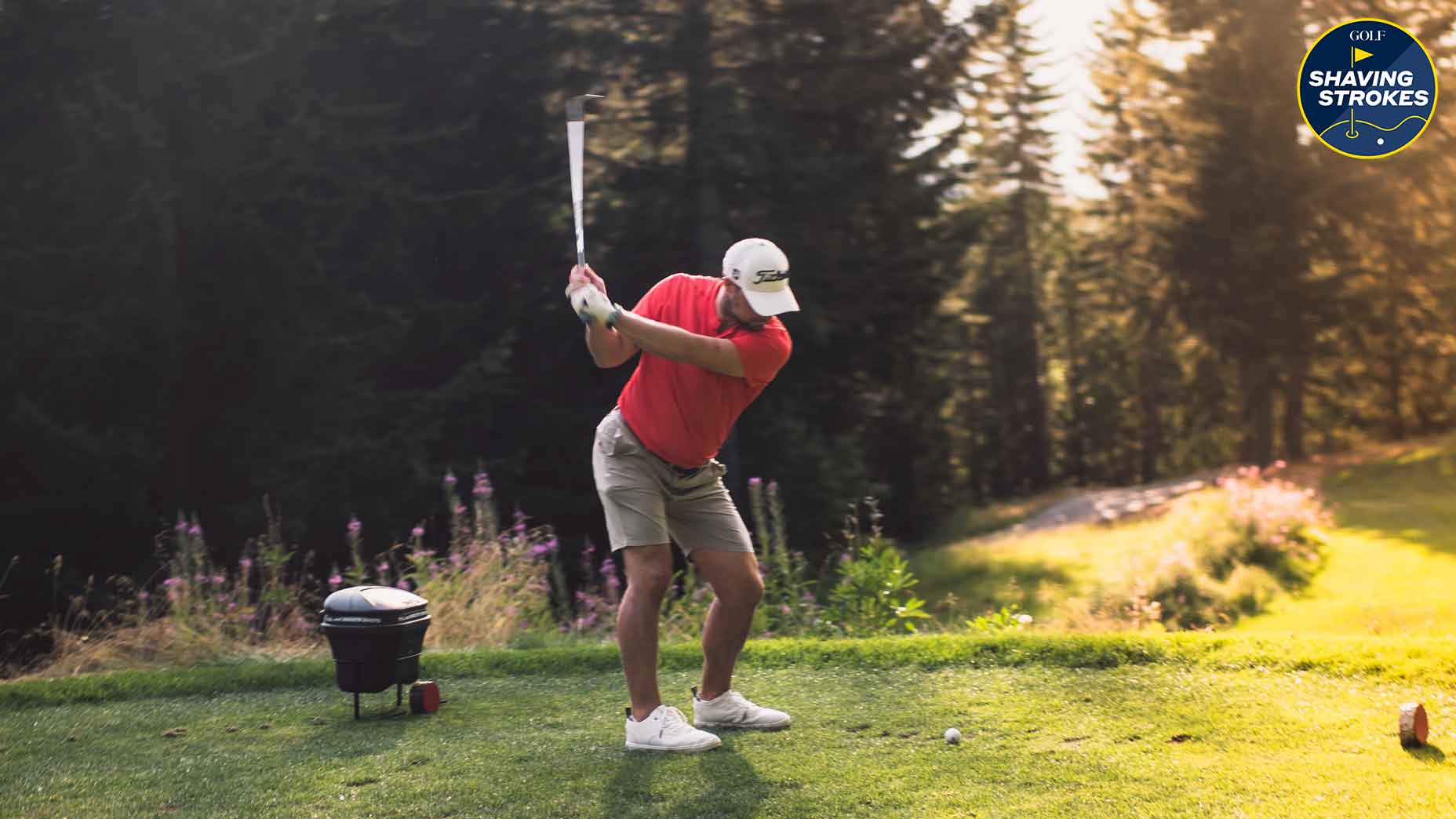 GOLF Instruction Editor Nick Dimengo hits shot at Fairmont Chateau Whistler Golf Club