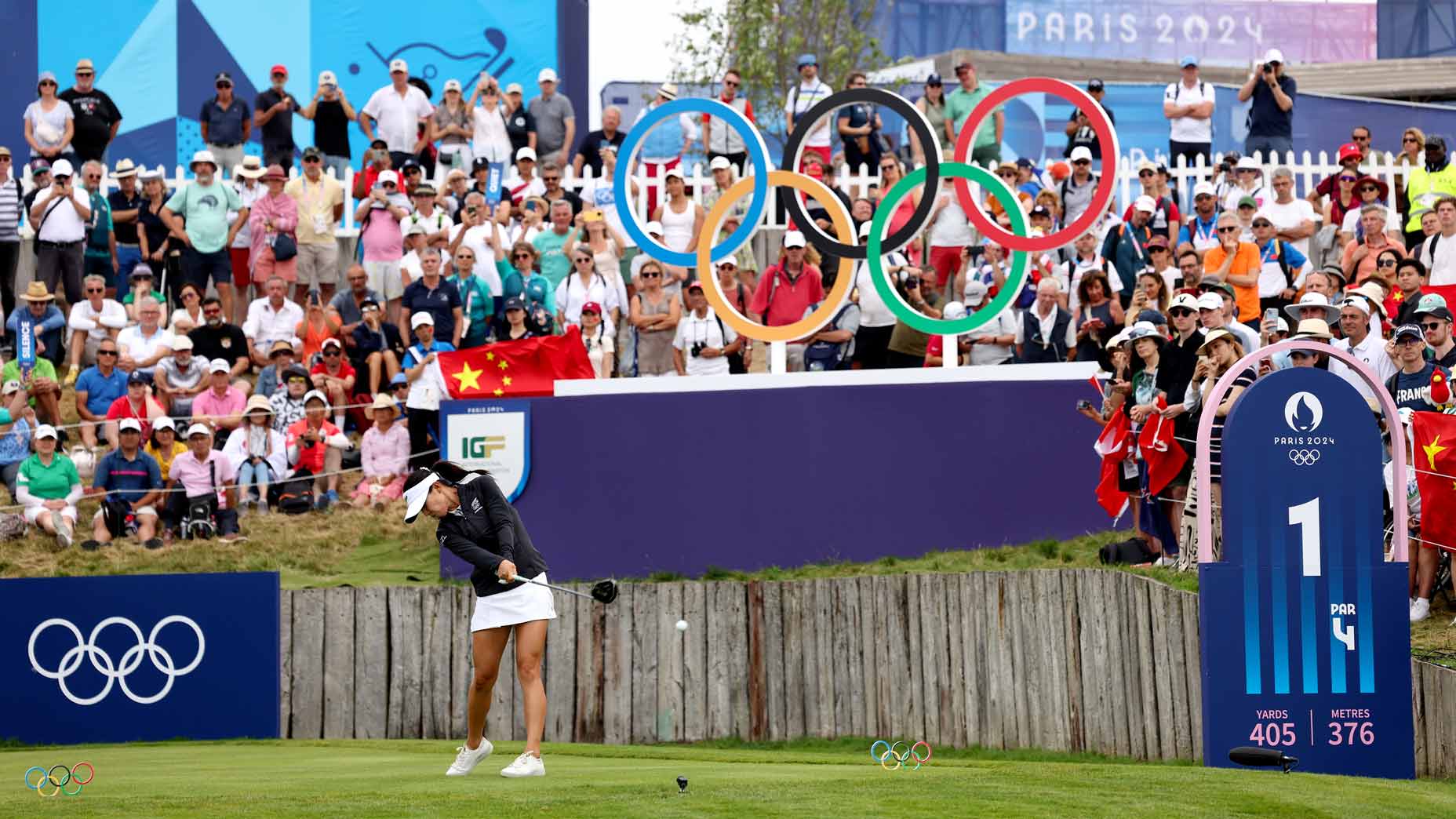 Pro golfer Lydia Ko tees off at Le Golf National during the 2024 Olympics.