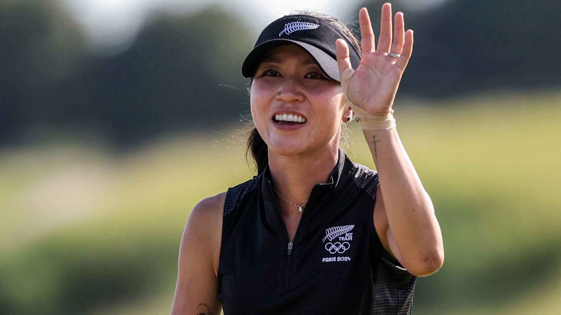 Lydia Ko celebrates winning the gold medal in the 4th round of the women's individual golf match of the Paris 2024 Olympic Games at Le Golf National in Guyancourt, southwest of Paris, on August 10, 2024.