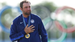 Scottie Scheffler gets emotional during the Olympic Golf medal ceremony.