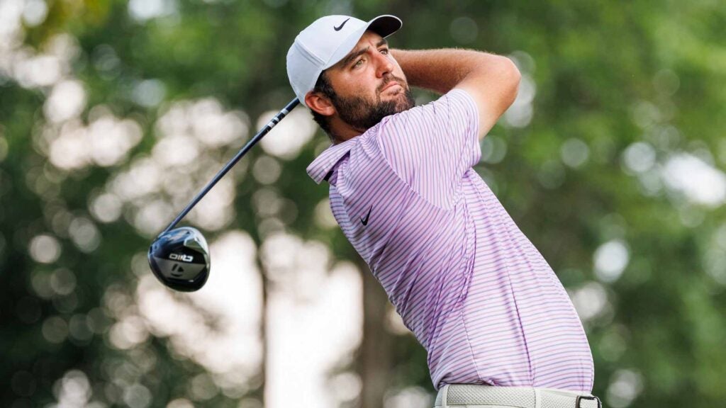 Pro golfer Scottie Scheffler watches drive at 2024 FedEx St. Jude Championship