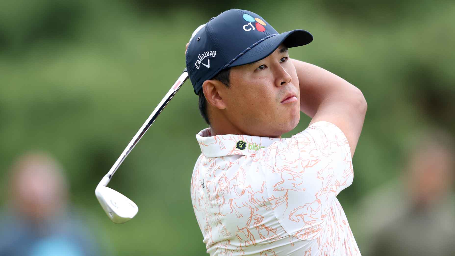 Si Woo Kim of South Korea plays his second shot on the 11th hole during day two of The 152nd Open championship at Royal Troon on July 19, 2024 in Troon, Scotland.