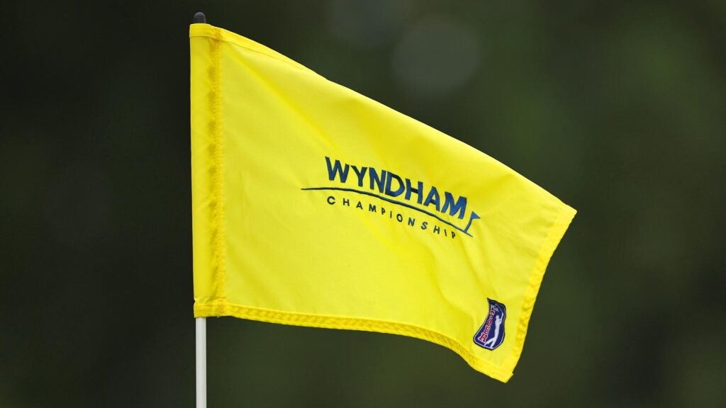 A yellow Wyndham Championship flag flaps at the PGA Tour event.