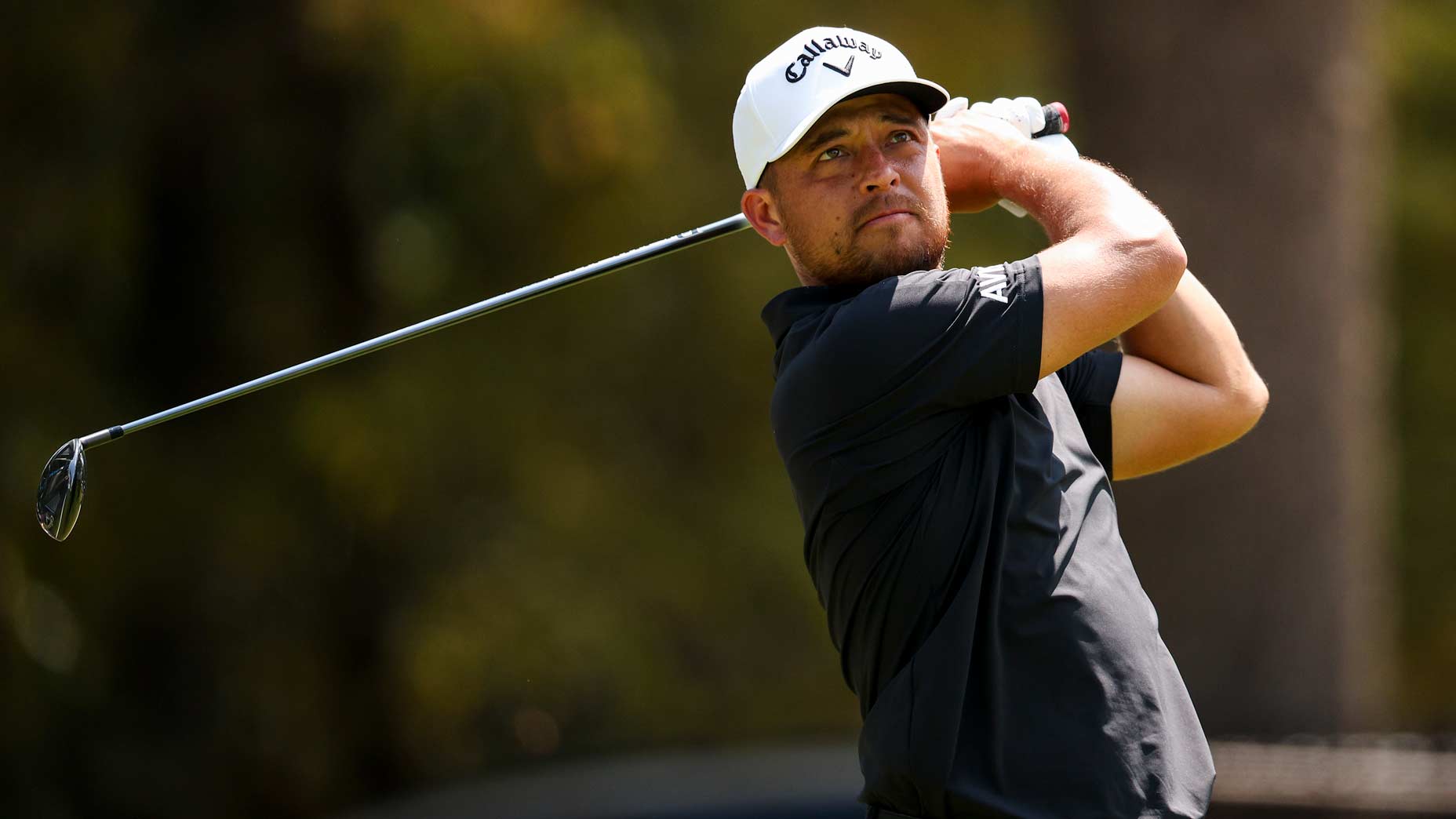 Pro golfer Xander Schauffele plays drive in practice at 2024 Tour Championship.