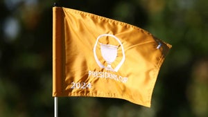 A 2024 Presidents Cup flag is seen prior to the 2024 Presidents Cup at The Royal Montreal Golf Club.