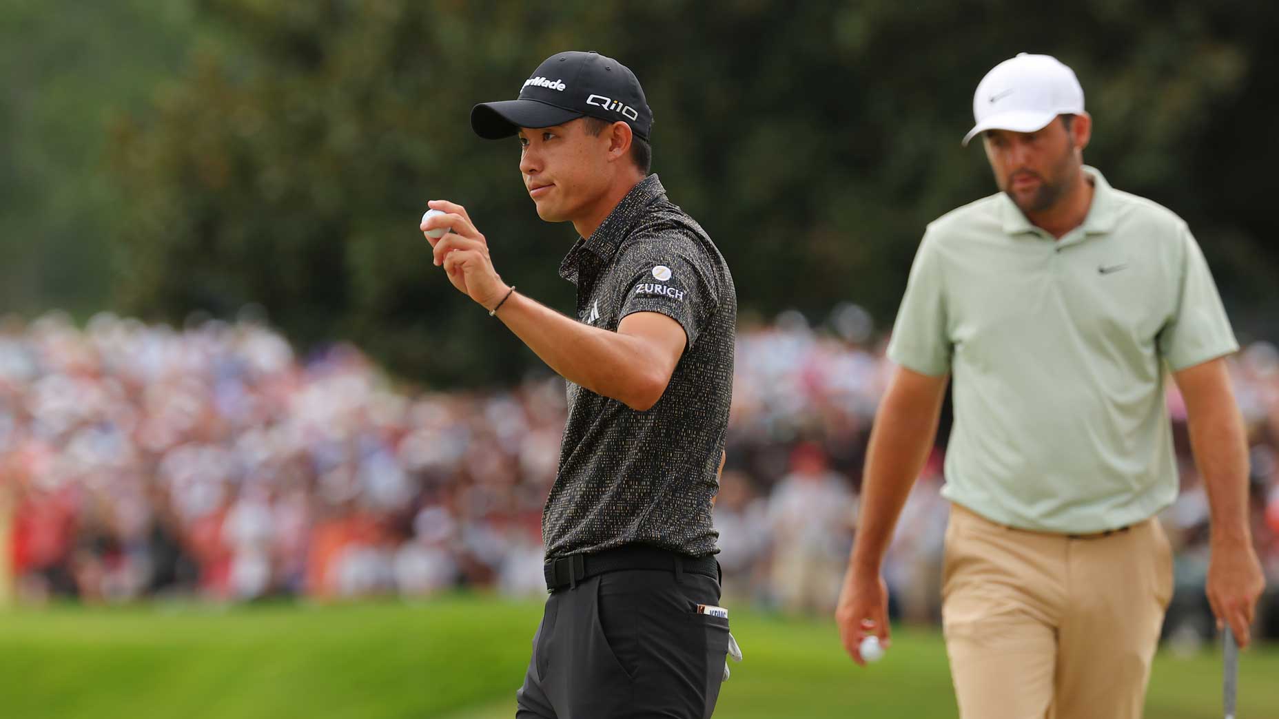 Collin Morikawa reacts to the crowd at the Tour Championship.