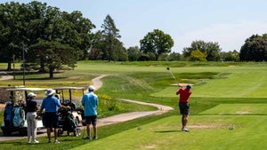 A foursome tees off the 1st hole at Jeffersonville Golf Club.