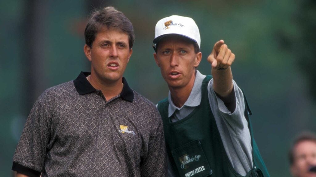 bones mackay and phil mickelson point at the 1994 Presidents Cup.