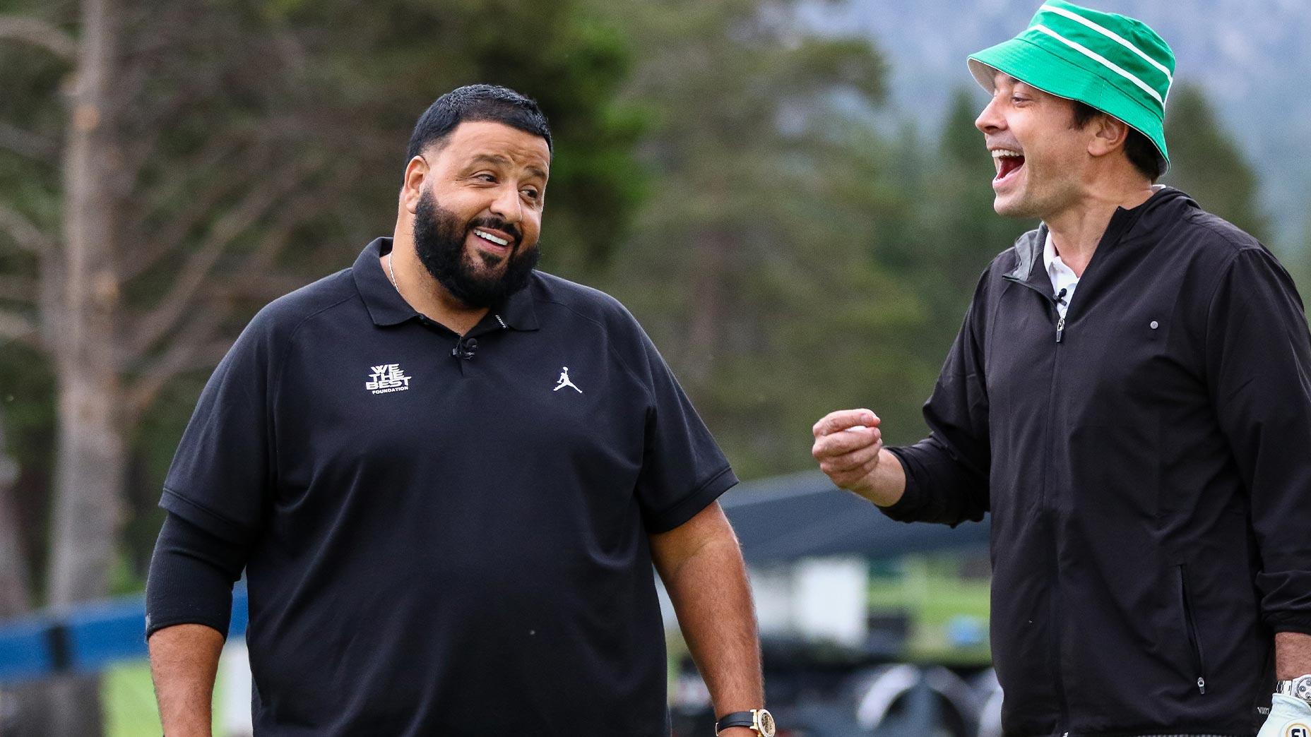 dj khaled and jimmy fallon laugh together at american century championship.