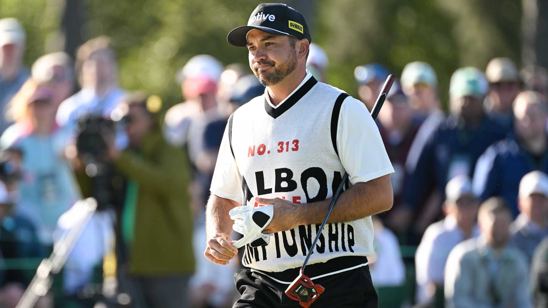 Pro golfer Jason Day walks on the 18th green during the continuation of the first round of 2024 Masters Tournament at Augusta National Golf Club.