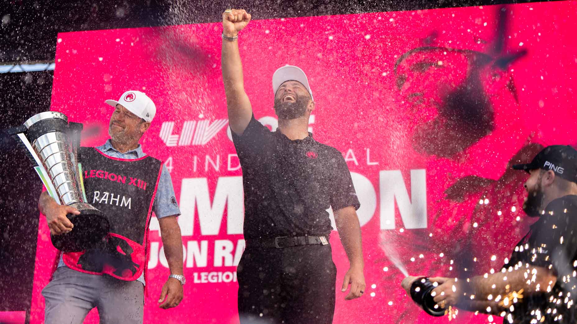 Pro golfer Jon Rahm pumps his fist after winning the overall individual championship title during day three of 2024 LIV Golf Chicago event.