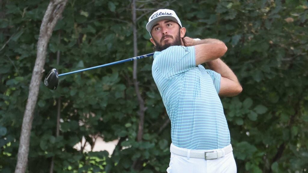 Pro golfer Max Homa watches his tee shot on the 8th hole during the final round of the 2024 BMW Championship.