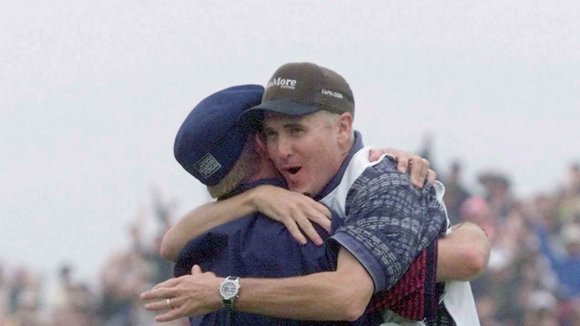 Mike Hicks celebrates with Payne Stewart at the 1999 US Open.