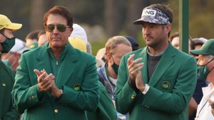 Phil Mickelson and Bubba Watson look on during the opening ceremony prior to the start of the first round of the 2021 Masters at Augusta National.